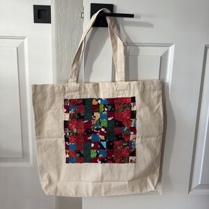 Hand Crafted Upcycled reusable tote, with quilted top 
18x16.5x3.5